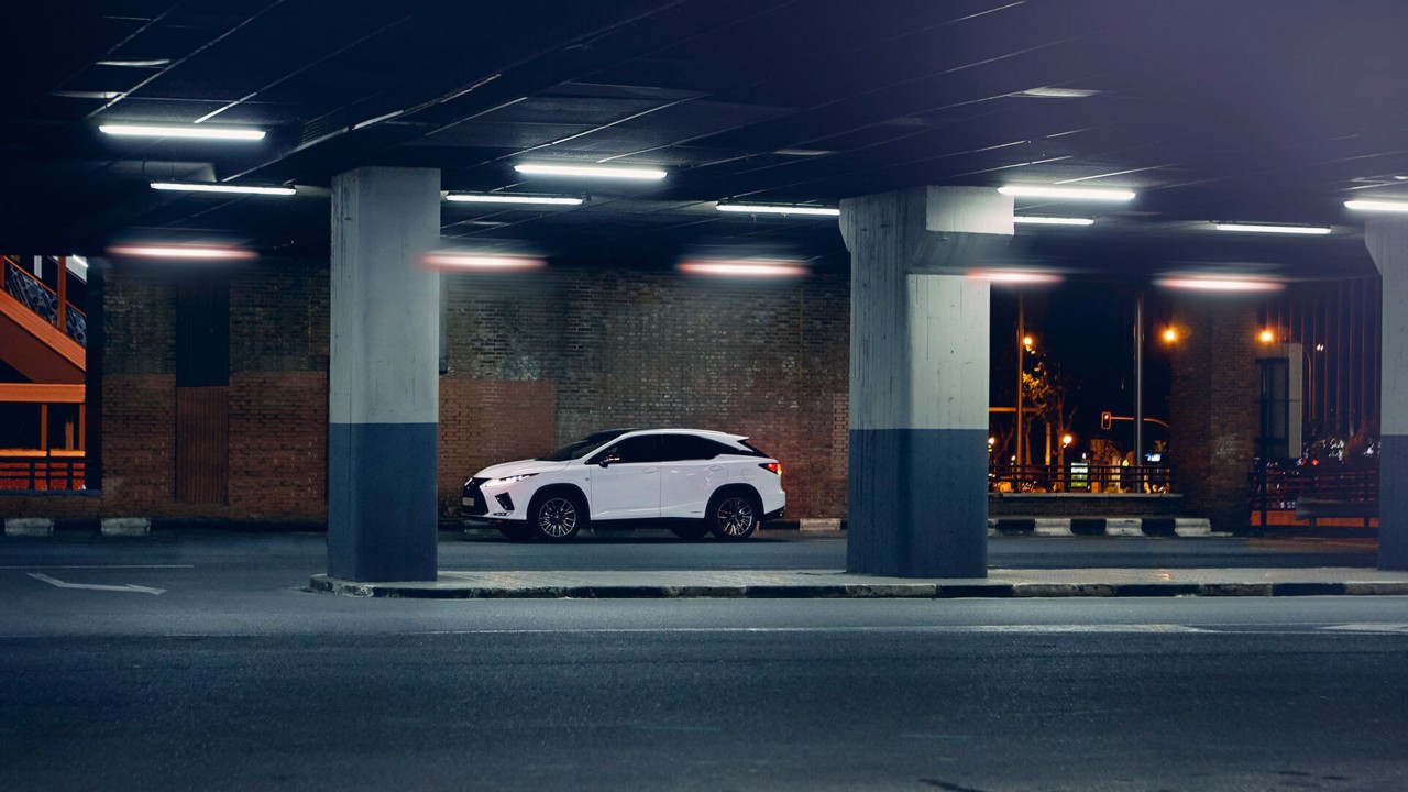 Lexus RX parked under a structure 