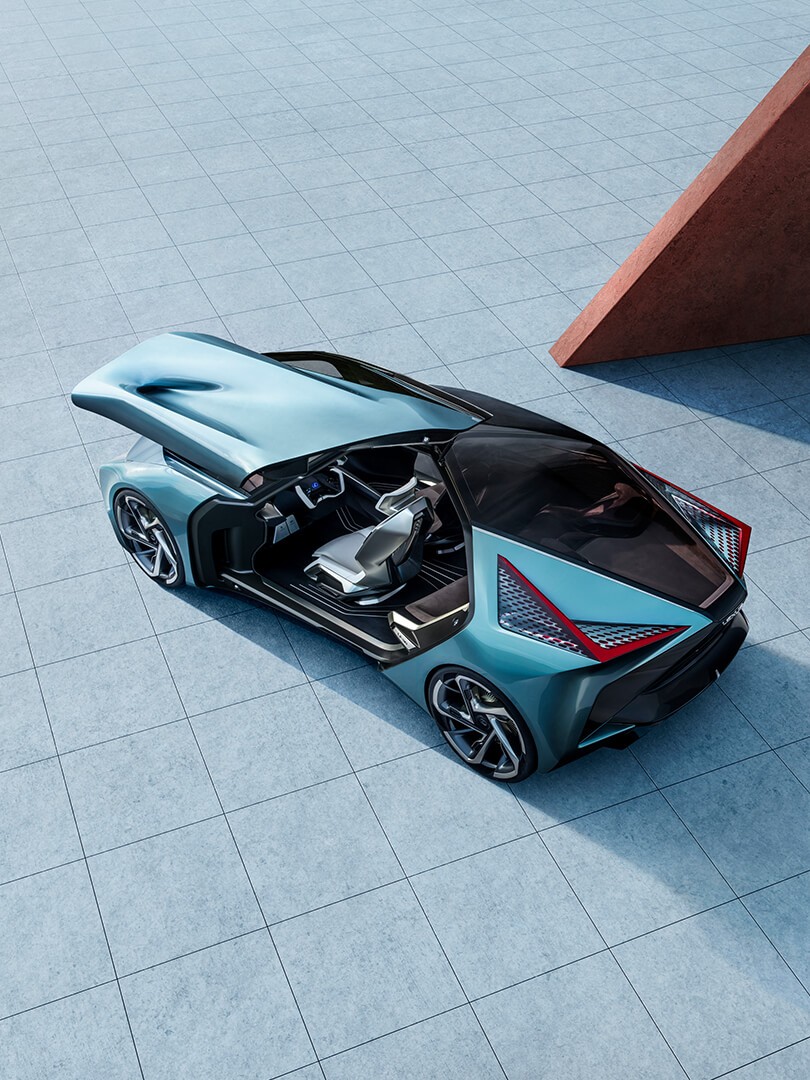 Aerial view of the Lexus LF-30 Electrified concept car with it's wing door open 