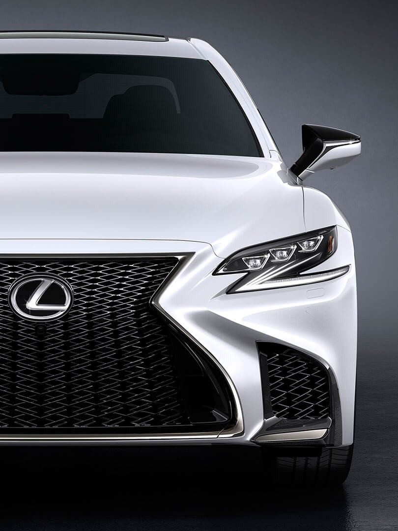 A close up of a Lexus bumper and grille