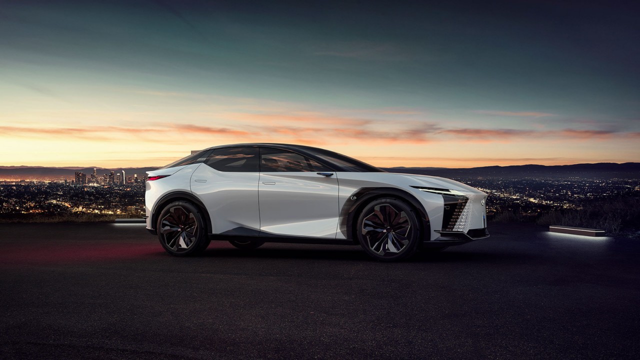 Lexus LF-Z Electrified concept car in the forefront of a city view 